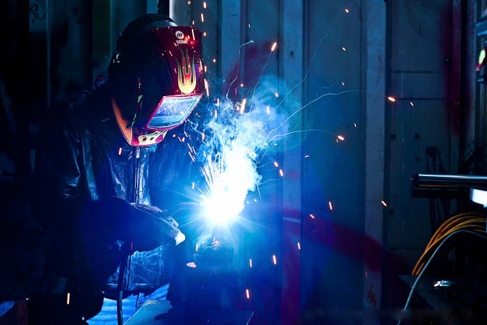 welder girl welding metal fabriction sparks heather lentz